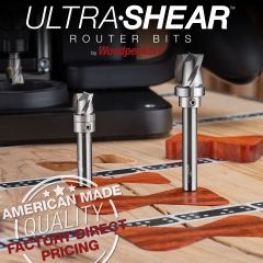 12mm and 16mm Clearing & Pattern Bits with Shaper Origin in background and butterfly inlays in foreground.
