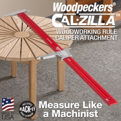 Cal-ZILLA measuring the diameter of a patio table.  
