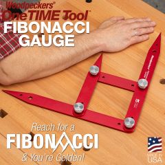 The Woodpeckers 48-inch Fibonacci Gauge resting on a workbench with its points spread out at the woodworker's elbow, wrist, and tips of his fingers. 
