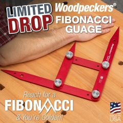 The Woodpeckers 48-inch Fibonacci Gauge resting on a workbench with its points spread out at the woodworker's elbow, wrist, and tips of his fingers. 

