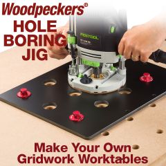 Hole Boring Jig in use creating 20mm holes on 96mm centers with plunge router. 
