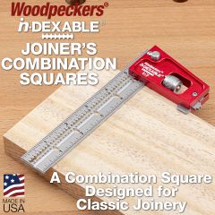 Woodpeckers Joiner's Combination Square resting flat on a board, with the tab engaged so the head does not flop off the edge. 
