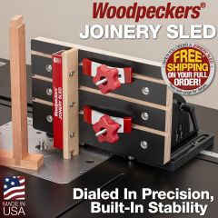 Joinery Sled on router table with sliding dovetail.
