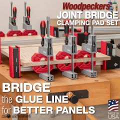 Joint Bridge clamping pads aligning joint faces on a 4-section panel glue-up