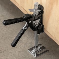 Trigger-Style Assembly Jack lifting a cabinet.
