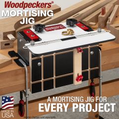 Woodpeckers Mortising Jig clamped to a workbench with various mortise and loose tenon stock on the workbench. 