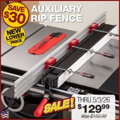 The Auxiliary Rip Fence installed on a Sawstop rip fence with track clamps in the standard, high fence orientation and the material support installed on the infeed.