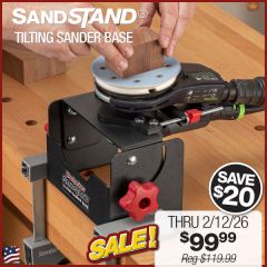 Sanding a small block of wood on sander secured in SandStand.