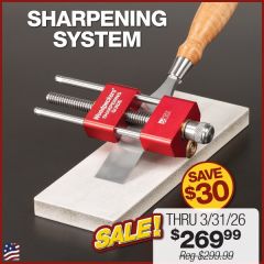 Woodpeckers Sharpening Guide with bench chisel on sharpening stone. Angle Gauge and Angle Fixture in background.