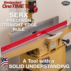 49-1/2" SERX Straight Edge Rule standing upright on outfeed table of 8" jointer. Feeler gauge in use on infeed table to check parallelism. 