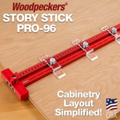 Using the offset tabs on the Story Stick Pro to mark interval dimensions on a plywood sheet, referencing the end with the stop. 