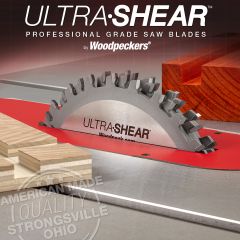 Ultimate Stacked Dado Set installed on table saw with sample cuts in plywood and hardwood.
