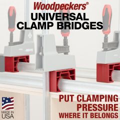 Detail of Universal Clamp Bridges stepping over clamp to provide clamping surface for second clamp. 
