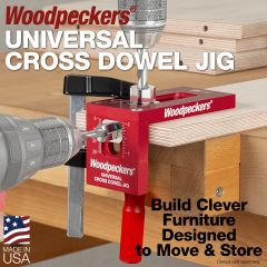 Photograph showing the cross dowel jig with drills in both faces, drilling to fit a cross dowel joint. 