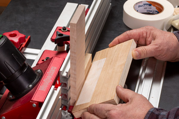  Attaching plywood guide block.